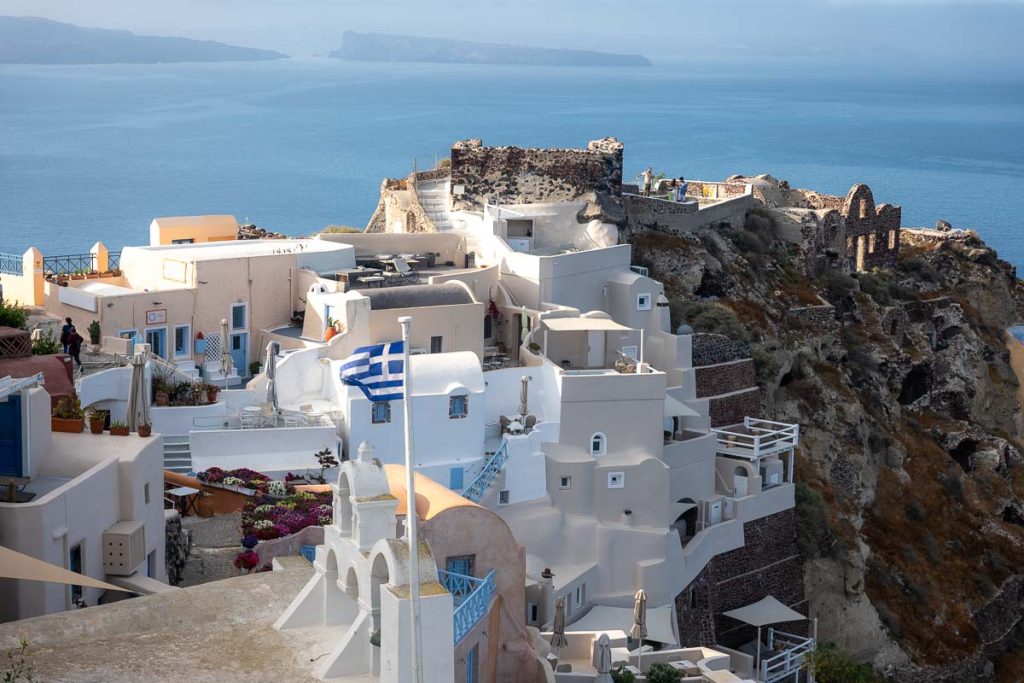 White wash village along a rocky coastline.