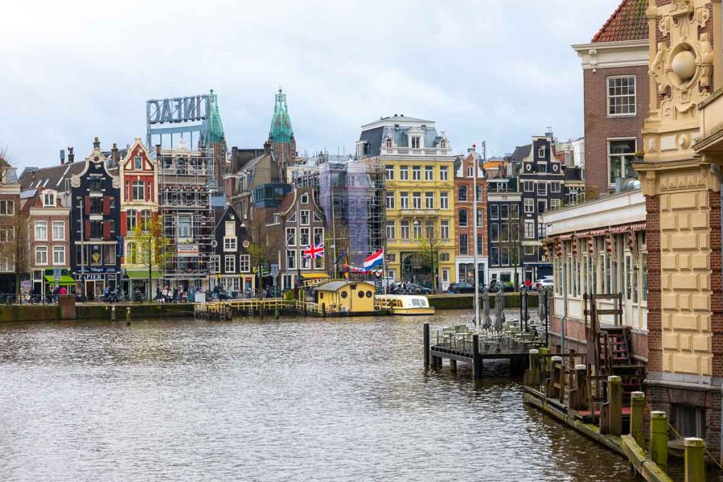 A canal lined with historic buildings in Amsterdam.