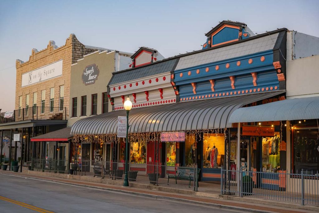 Building fronts in a town square.