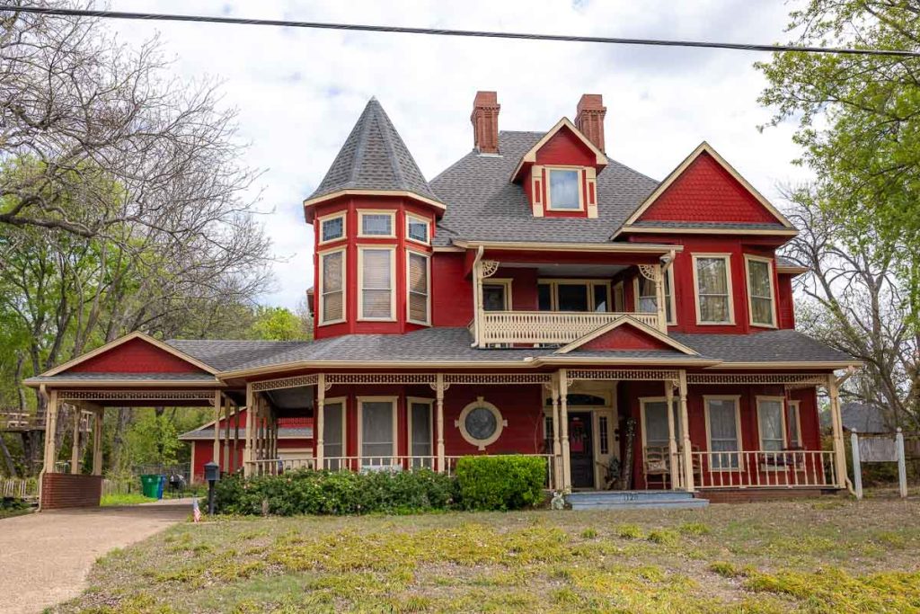 Red Queen Anne Victorian style house.